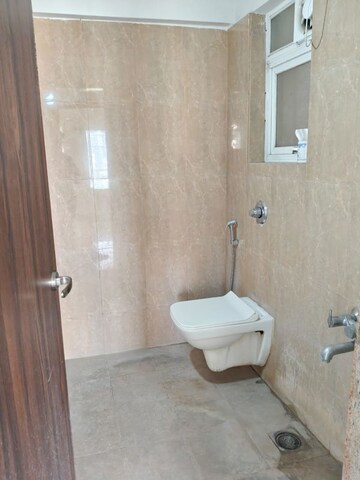 Bathroom in 3 BHK Apartment at Kumar Peninsula, Baner – for Rent