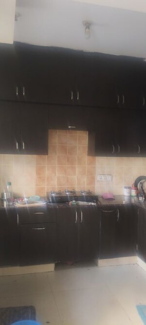 Kitchen in 3.5 BHK Apartment at Aims Golf City, Sector 75 – for Rent