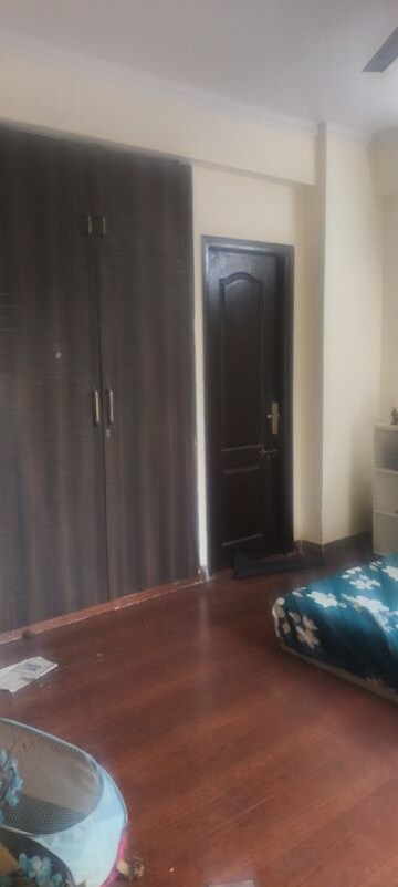 Living Room in 3.5 BHK Apartment at Aims Golf City, Sector 75 – for Rent