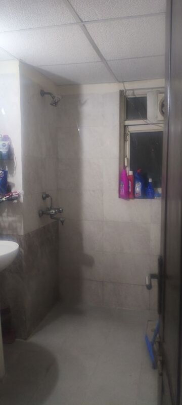 Bathroom in 3.5 BHK Apartment at Aims Golf City, Sector 75 – for Rent