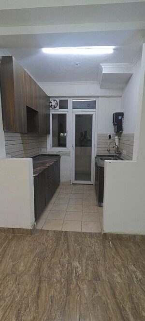 Kitchen in 3 BHK Apartment at Amrapali Crystal Homes, Sector 76 – for Rent