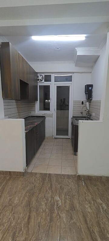 Kitchen in 3 BHK Apartment at Amrapali Crystal Homes, Sector 76 – for Rent