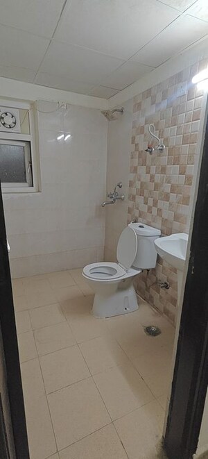 Bathroom in 3 BHK Apartment at Amrapali Crystal Homes, Sector 76 – for Rent