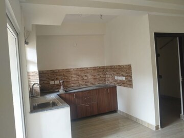 Kitchen in 3 BHK Apartment at Amrapali Dream Valley, Tech Zone 4 Greater Noida – for Sale
