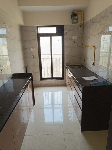 Kitchen in 2 BHK Apartment at Oxford Navrang Crystal, Goregaon West – for Rent