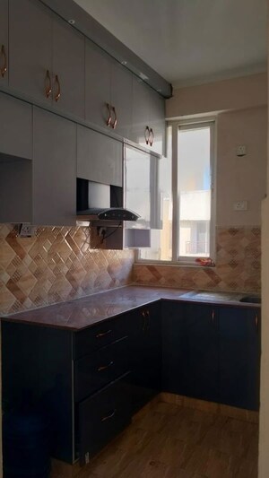 Kitchen in 3 BHK Apartment at Amrapali Dream Valley, Tech Zone 4 Greater Noida – for Sale