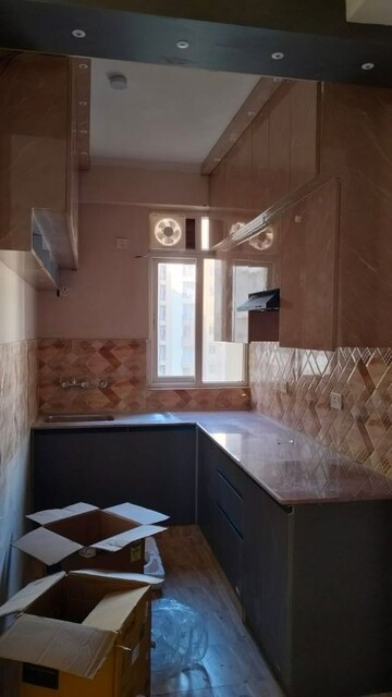 Kitchen in 3 BHK Apartment at Amrapali Dream Valley, Tech Zone 4 Greater Noida – for Sale