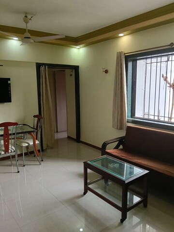 Living Room in 2 BHK Apartment at Shri Ganesh Aangan CHS, Kandivali East – for Rent