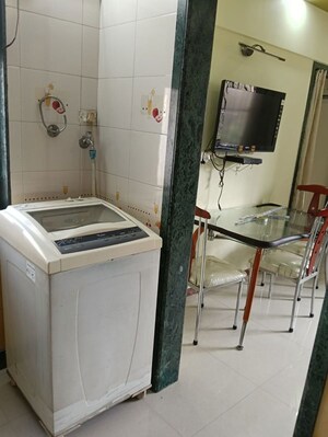 Bathroom in 2 BHK Apartment at Shri Ganesh Aangan CHS, Kandivali East – for Rent