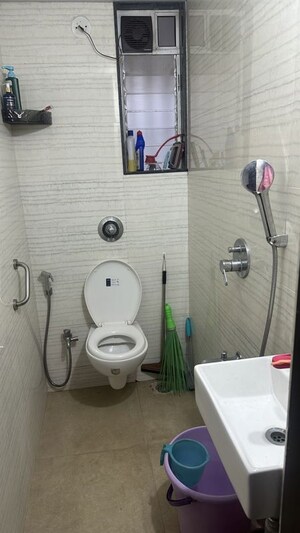 Bathroom in 2 BHK Apartment at Hubtown Harmony, Matunga – for Rent
