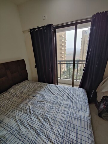 Bedroom in 1 BHK Apartment at Sunteck West World, Tivri – for Rent