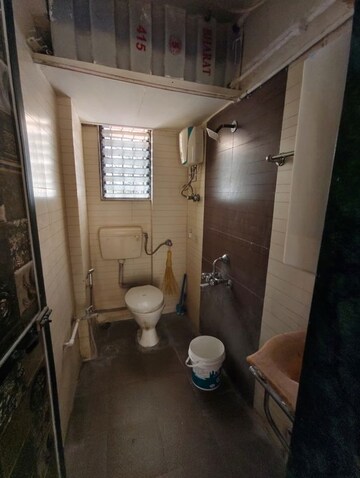 Bathroom in 1 BHK Apartment at Kavya Hill View CHS, Anand Nagar – for Rent