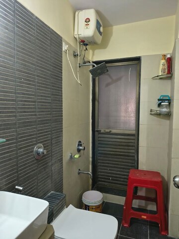 Bathroom in 2 BHK Apartment at Dosti Vihar, Samata Nagar – for Rent
