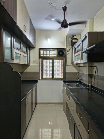 Kitchen in 2 BHK Apartment at Dosti Vihar, Samata Nagar – for Rent