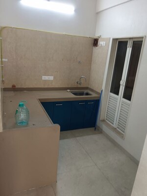 Kitchen in 2 BHK Apartment at Dosti West County, Balkum Pada – for Rent