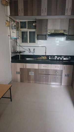 Kitchen in 2 BHK Apartment at Mount N Glory, Kharadi – for Rent