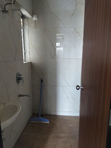 Bathroom in 1 BHK Apartment at Raunak Bliss, Ghodbunder Road – for Rent