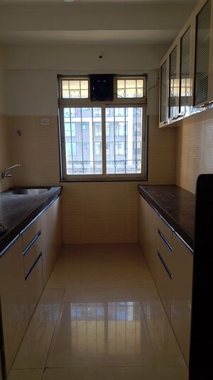 Kitchen in 3 BHK Apartment at Dosti Blossom, Wadala East – for Rent