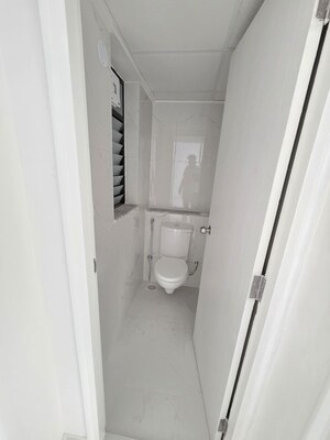 Bathroom in 1 BHK Apartment at Runwal Gardens, Dombivli East – for Rent