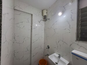 Bathroom in 2 BHK Apartment at Kakad Paradise Phase 2, Mira Road East – for Rent