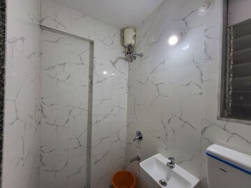 Bathroom in 2 BHK Apartment at Kakad Paradise Phase 2, Mira Road East – for Rent