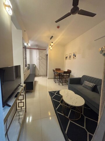 Living Room in 1.5 BHK Apartment at Brigade El Dorado Gallium, Bagaluru – for Rent