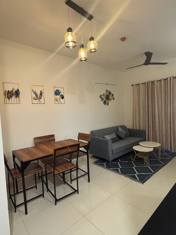 Living Room in 1.5 BHK Apartment at Brigade El Dorado Gallium, Bagaluru – for Rent