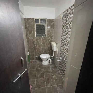 Bathroom in 2.5 BHK Apartment at Dalvi Nagar – for Sale