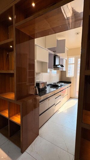 Kitchen in 3 BHK Apartment at Rishita Manhattan, Sarsawan – for Rent