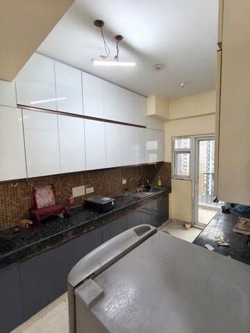 Kitchen in 2 BHK Apartment at Gaur City 2 - 11th Avenue, Sector 16c Greater Noida – for Rent