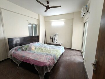 Bedroom in 2 BHK Apartment at JKG Palm Court, Sector 16c Greater Noida – for Rent