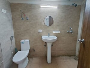Bathroom in 2 BHK Apartment at JKG Palm Court, Sector 16c Greater Noida – for Rent