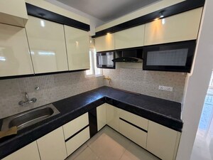 Kitchen in 2 BHK Apartment at JNC The Park, Sector 16c Greater Noida – for Rent