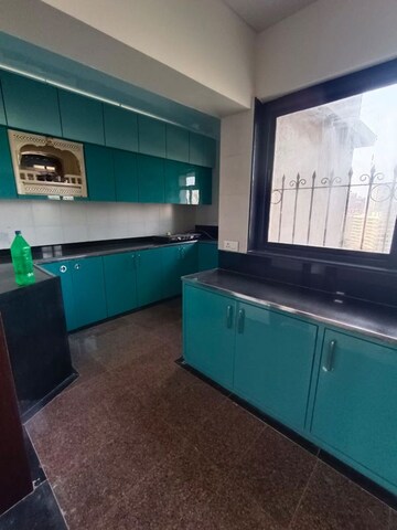 Kitchen in 3 BHK Apartment at Belscot Chs Ltd, Andheri West – for Rent