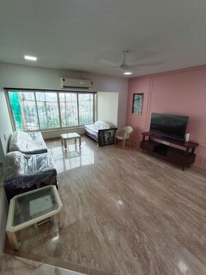 Living Room in 3 BHK Apartment at Belscot Chs Ltd, Andheri West – for Rent