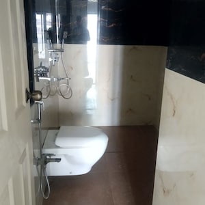 Bathroom in 2 BHK Apartment at Mhada 24 LIG Apartments, Goregaon West – for Rent
