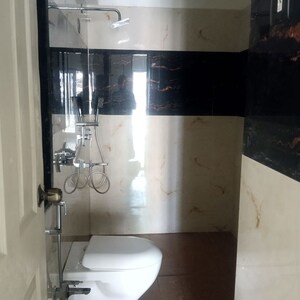 Bathroom in 2 BHK Apartment at Mhada 24 LIG Apartments, Goregaon West – for Rent