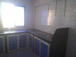 Kitchen in 2 BHK Apartment at Asmita Jyoti CHS, Malad West – for Rent