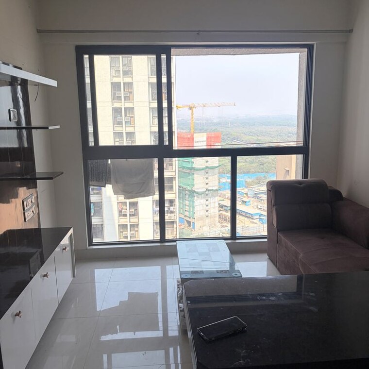 Living Room, lodha-crown-quality-homes 1 Bedroom 317 Sq.Ft. Apartment In Saket Complex Thane 10011893