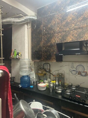 Kitchen in 2 BHK Apartment at Windsor and Nova Society, Ahinsa Khand 2 – for Sale