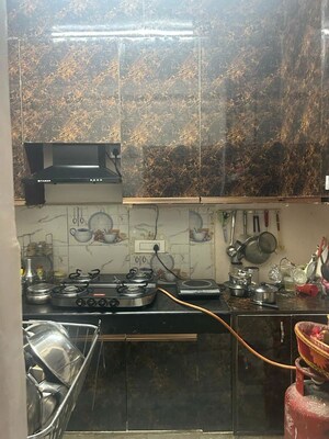 Kitchen in 2 BHK Apartment at Windsor and Nova Society, Ahinsa Khand 2 – for Sale