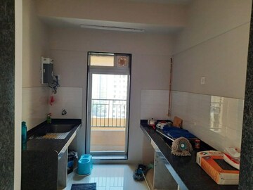 Living Room in 2 BHK Apartment at Rustomjee Azziano Wing E, Thane West – for Rent