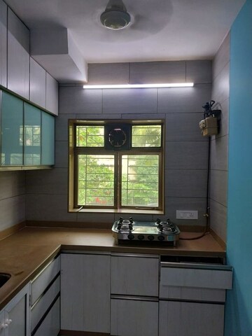 Kitchen in 2 BHK Apartment at Trishul CHS, Andheri West – for Rent