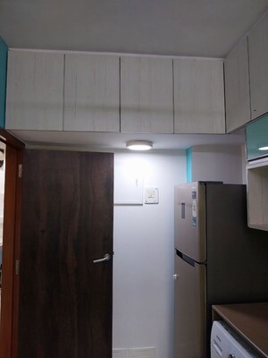 Kitchen in 2 BHK Apartment at Trishul CHS, Andheri West – for Rent