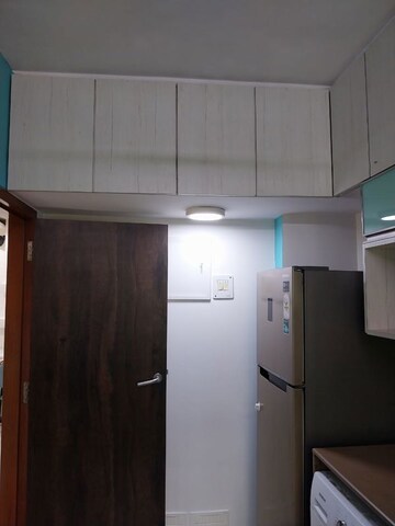 Kitchen in 2 BHK Apartment at Trishul CHS, Andheri West – for Rent