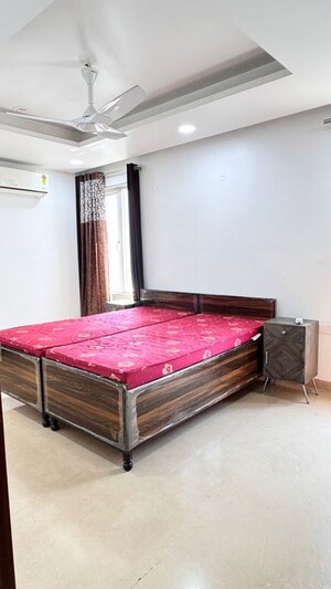 Bedroom in 4 BHK Builder Floor at Sushant Lok I – for Rent