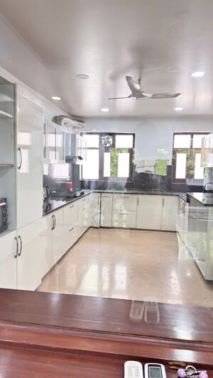 Kitchen in 4 BHK Builder Floor at Sushant Lok I – for Rent