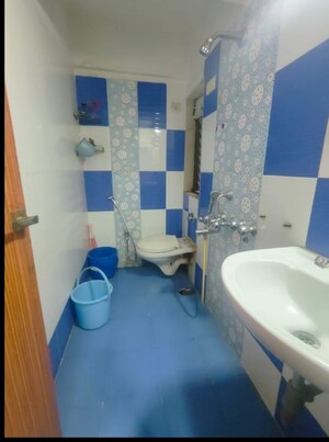 Bathroom in 3 BHK Apartment at Jangid Heights, Ghodbunder Road – for Sale