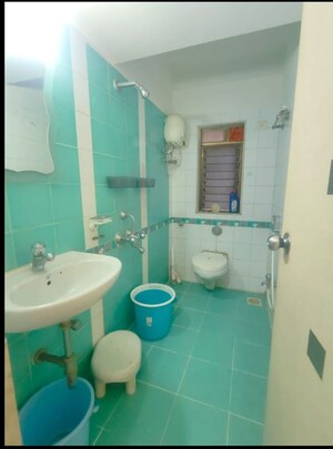 Bathroom in 3 BHK Apartment at Jangid Heights, Ghodbunder Road – for Sale