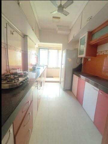 Kitchen in 3 BHK Apartment at Jangid Heights, Ghodbunder Road – for Sale